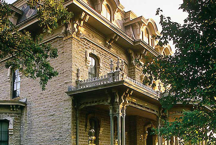 Early evening summertime photo of Alexander Ramsey House porch